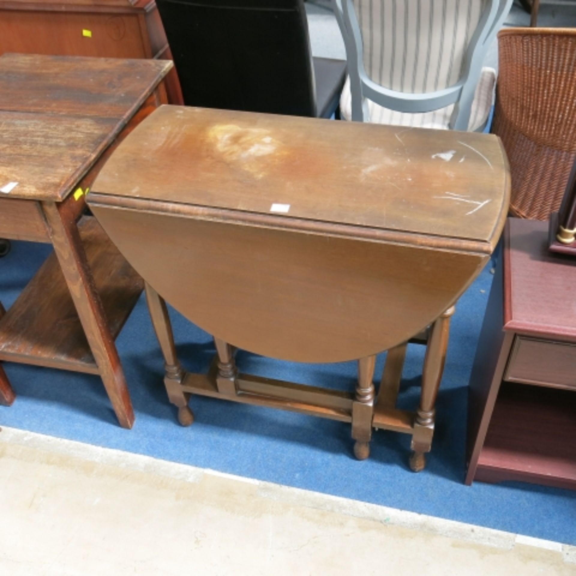 A teak? Oval drop leaf table together with a dark wood single drawer hallway table, 2 x small