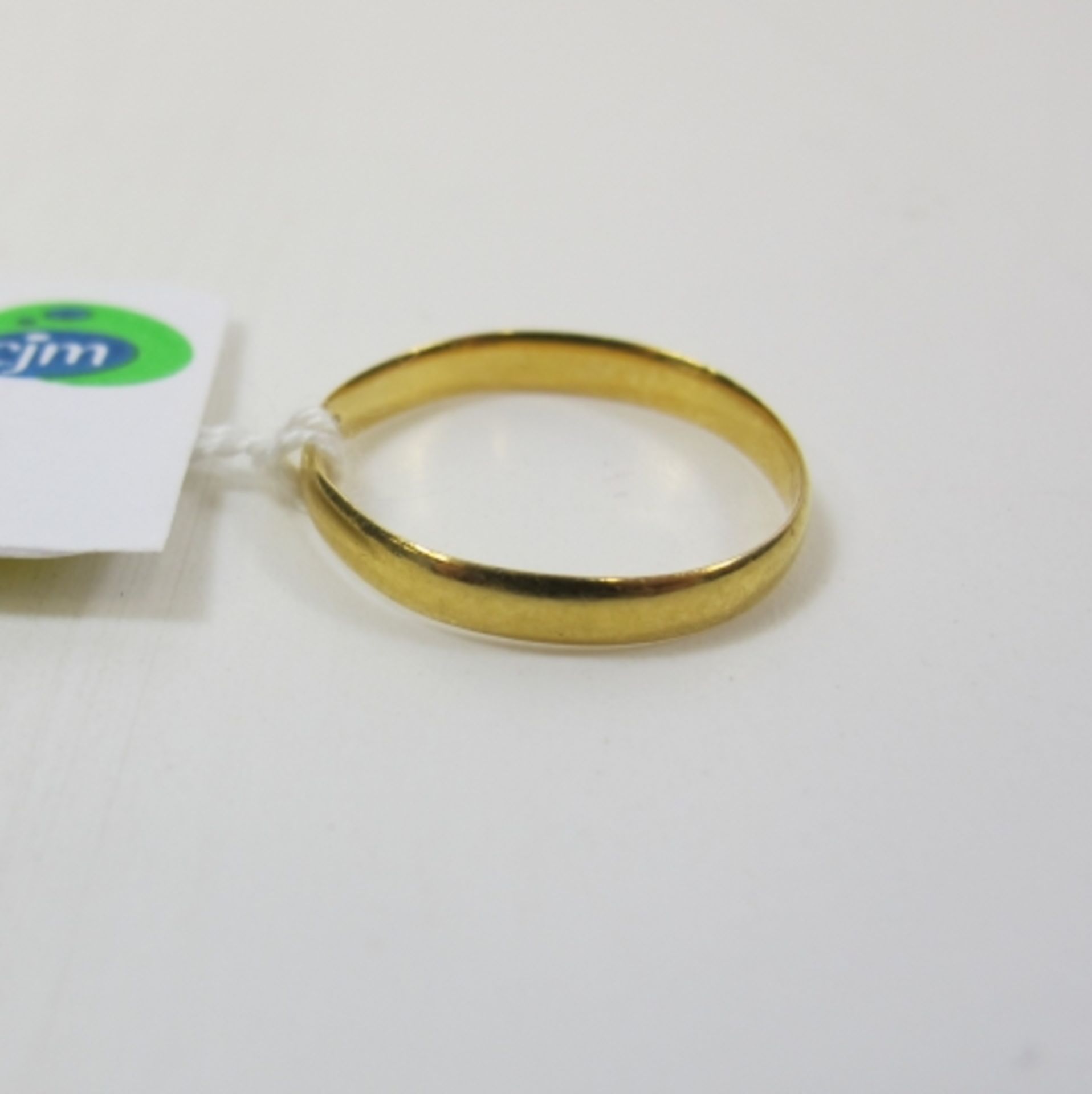 A 22ct Gold (1932) Plain Band Ring, Size J½ (est £30-£60)