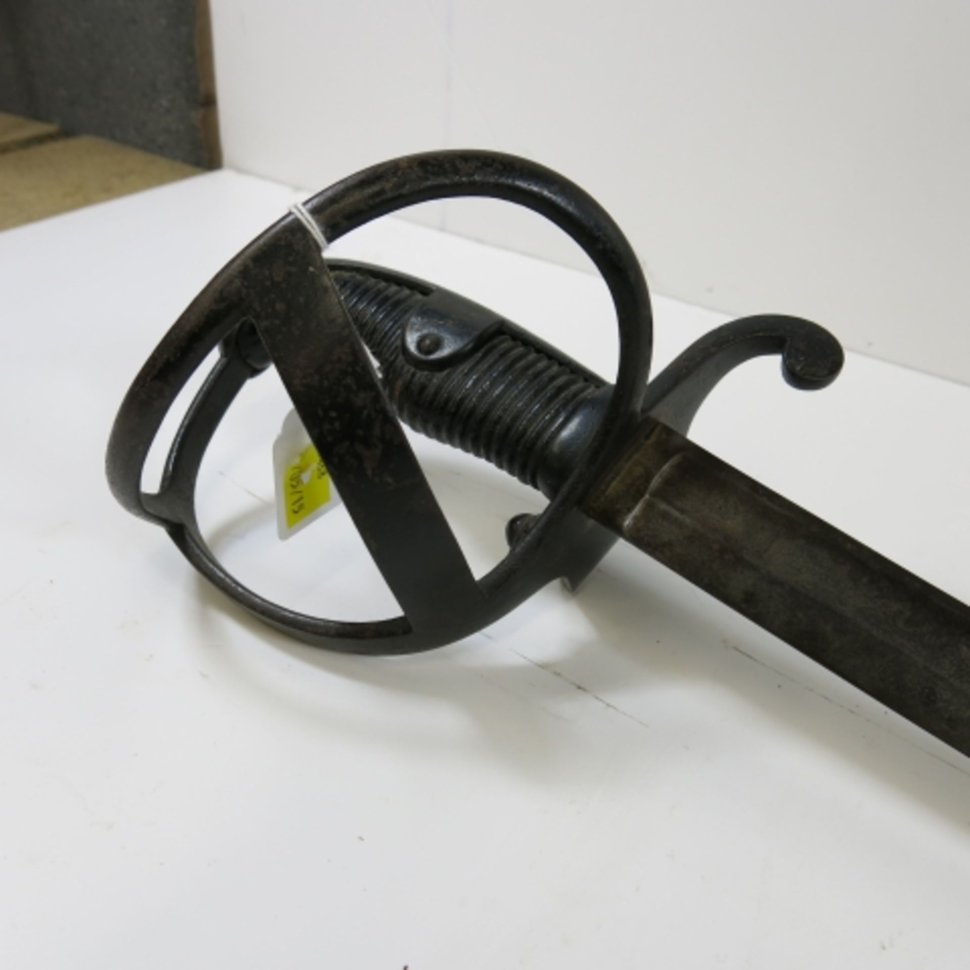 Early 20th century German Cavalry Sword, open basket with wooden grip. 90cm curved blade with - Image 3 of 3