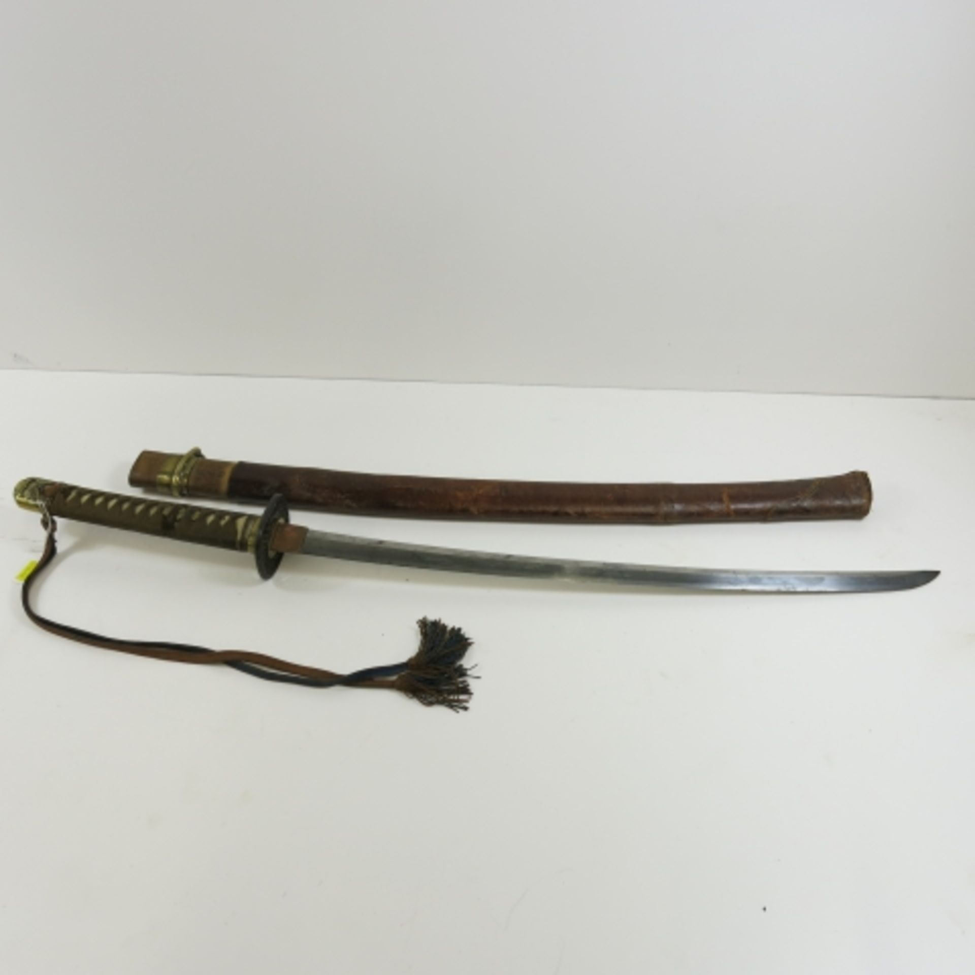 A Japanese Military Officer's Sword. The sword has fairly standard army mounts. The handle is - Image 2 of 3