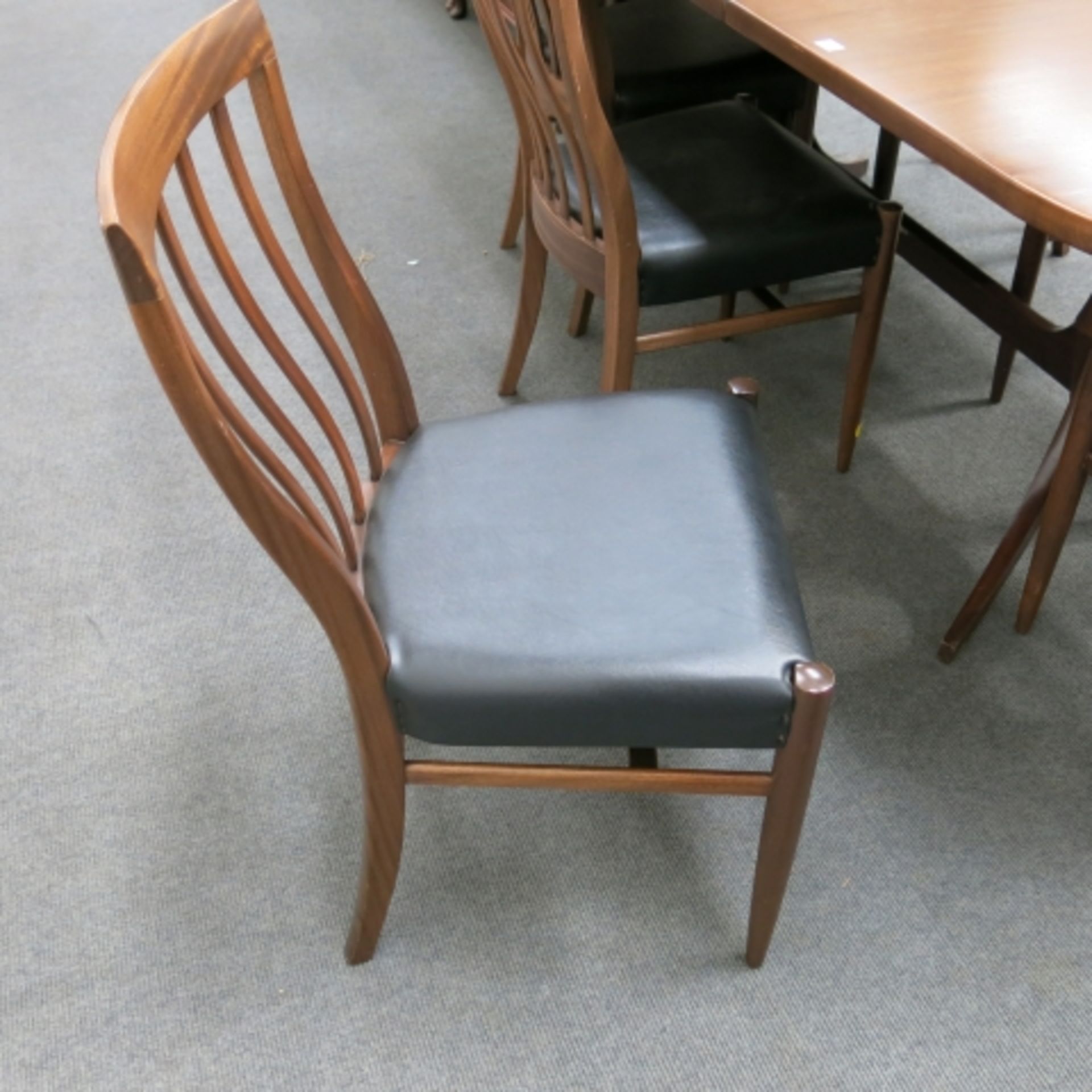 A 1960s walnut finish dining suite comprising pedestal table with inset folding leaf (240cm - Image 10 of 13