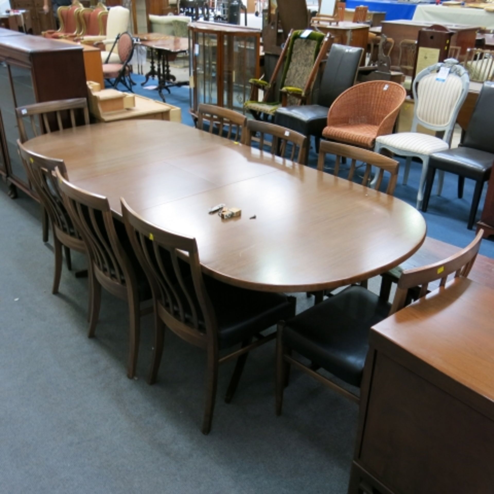 A 1960s walnut finish dining suite comprising pedestal table with inset folding leaf (240cm - Image 2 of 13