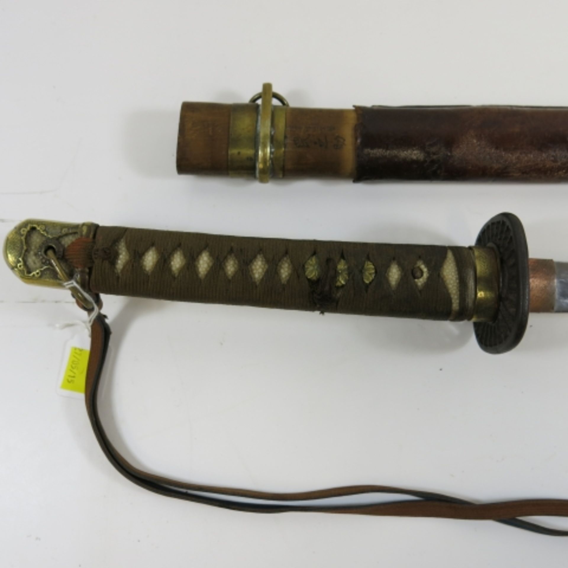 A Japanese Military Officer's Sword. The sword has fairly standard army mounts. The handle is - Image 3 of 3