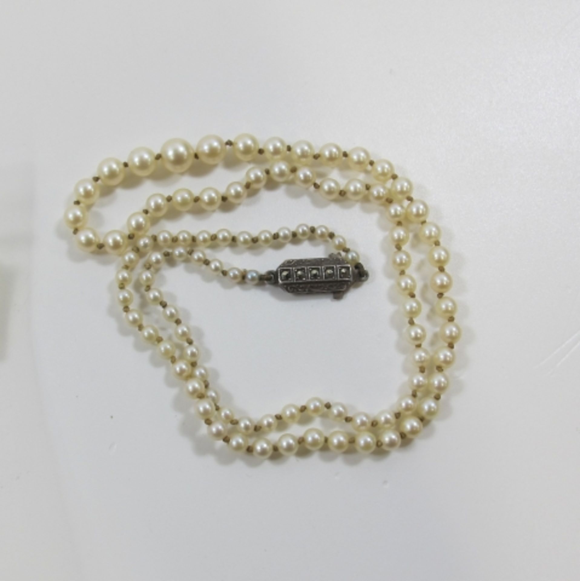 Vintage cultured Pearl necklace with Silver & Marcasite clasp (est. £40 - £60)