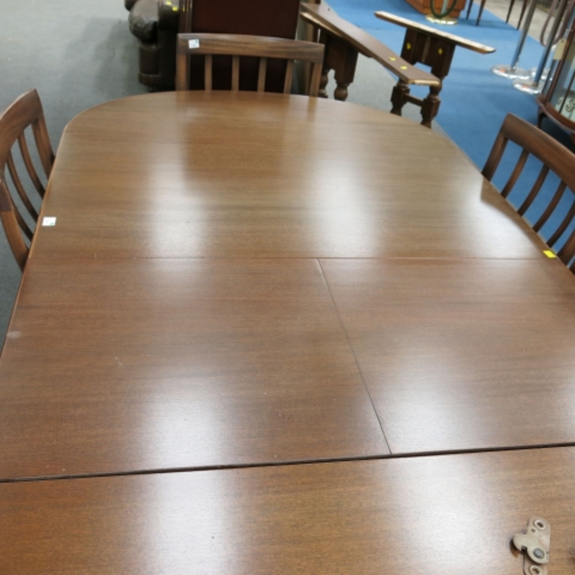 A 1960s walnut finish dining suite comprising pedestal table with inset folding leaf (240cm - Image 9 of 13