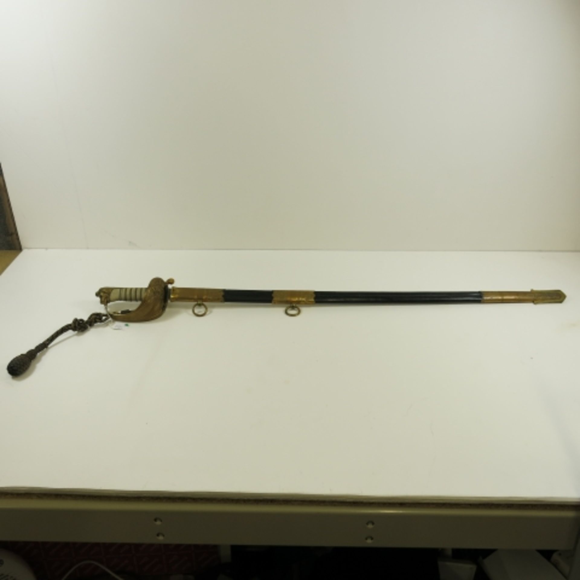 S.R Gould & Sons, Naval Outfitters Devonport. A 20th century Naval Officer's Dress Sword, having