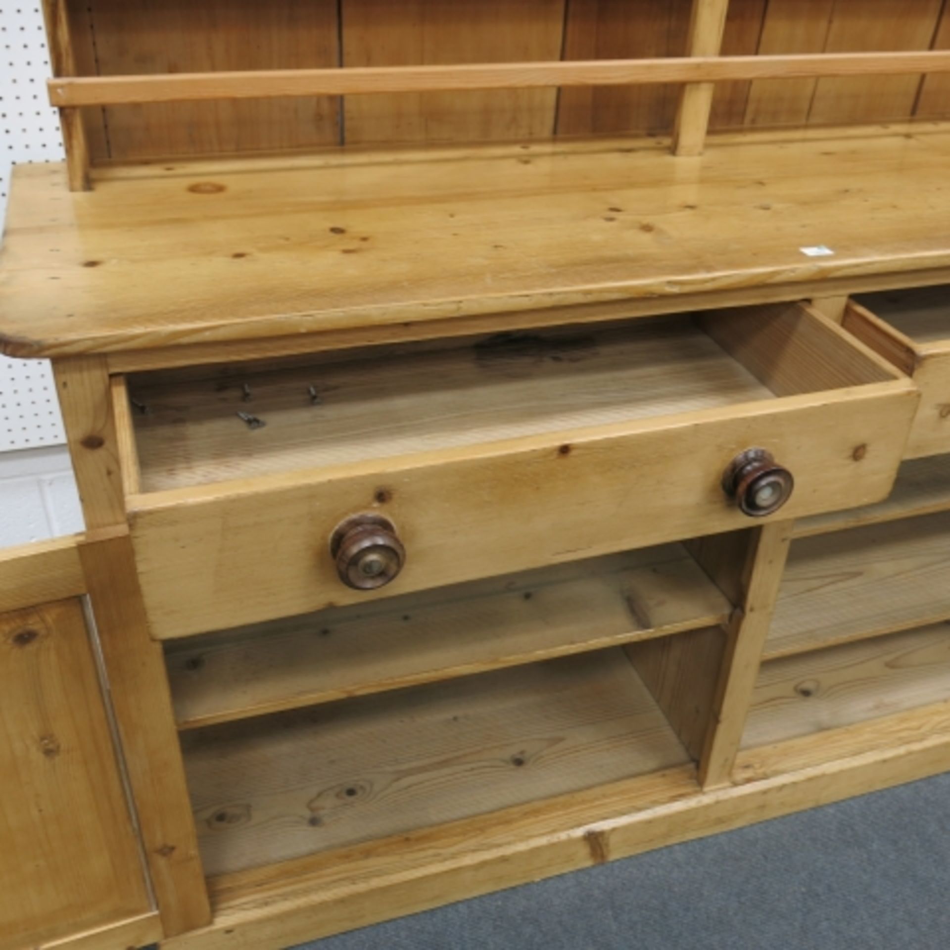 A Victorian stripped and polished pine 'Welsh' dresser with large delft rack over cupboards and - Image 5 of 9