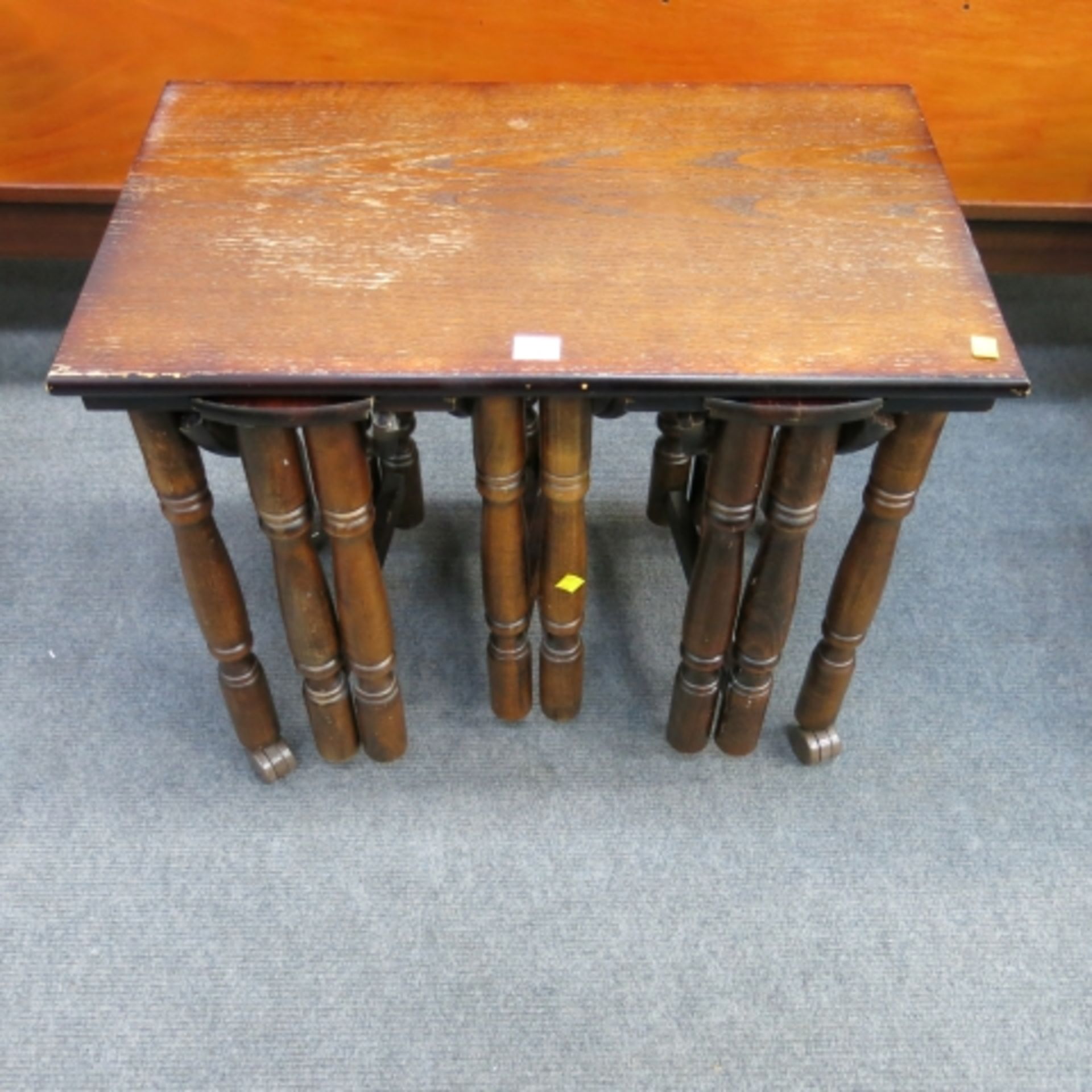 Oak finish rectangular coffee table with three inset folding circular occasional tables (est. £20-£