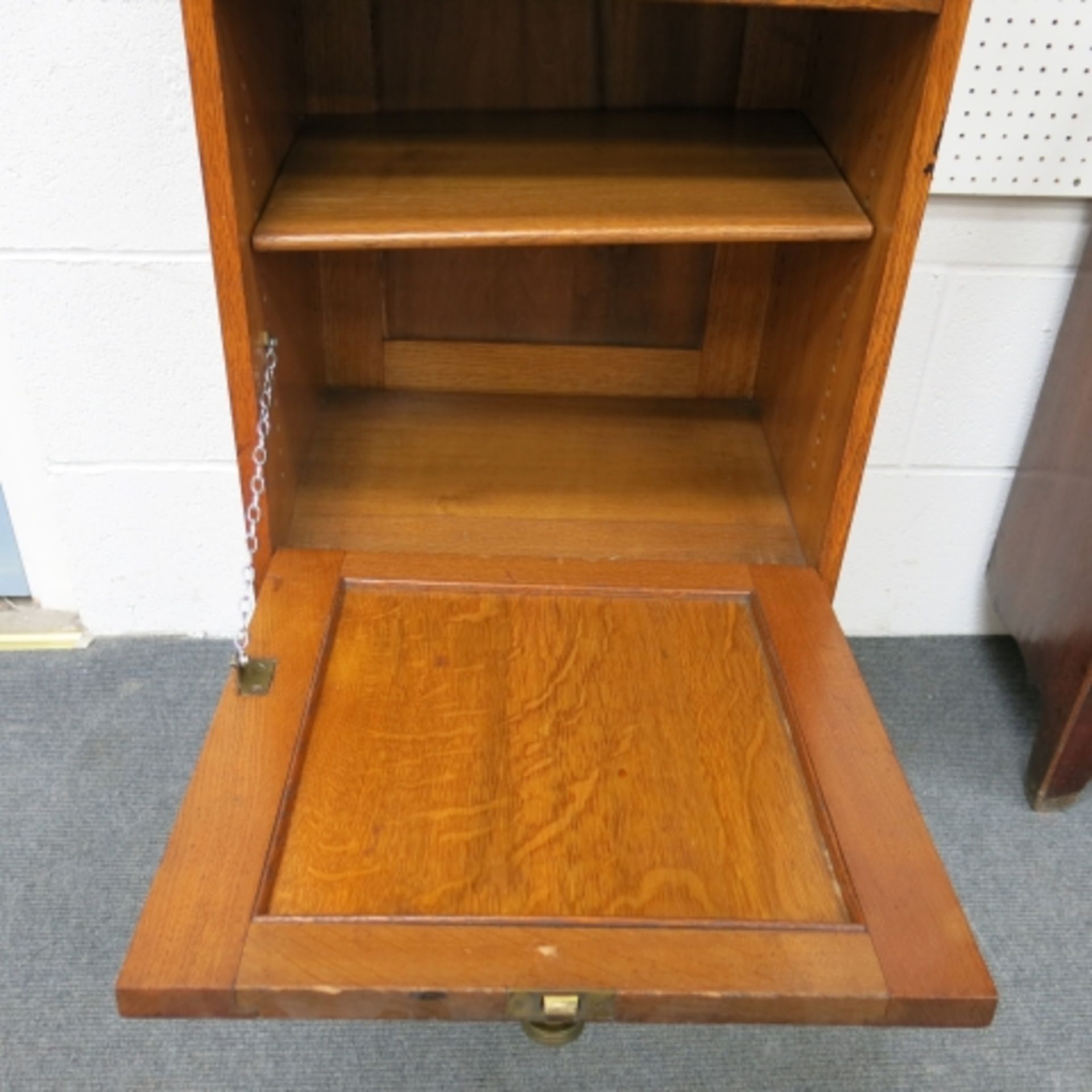 An Arts & Crafts oak narrow side cabinet with hinged single door. 63cm. (est. £40-£80) - Image 4 of 6