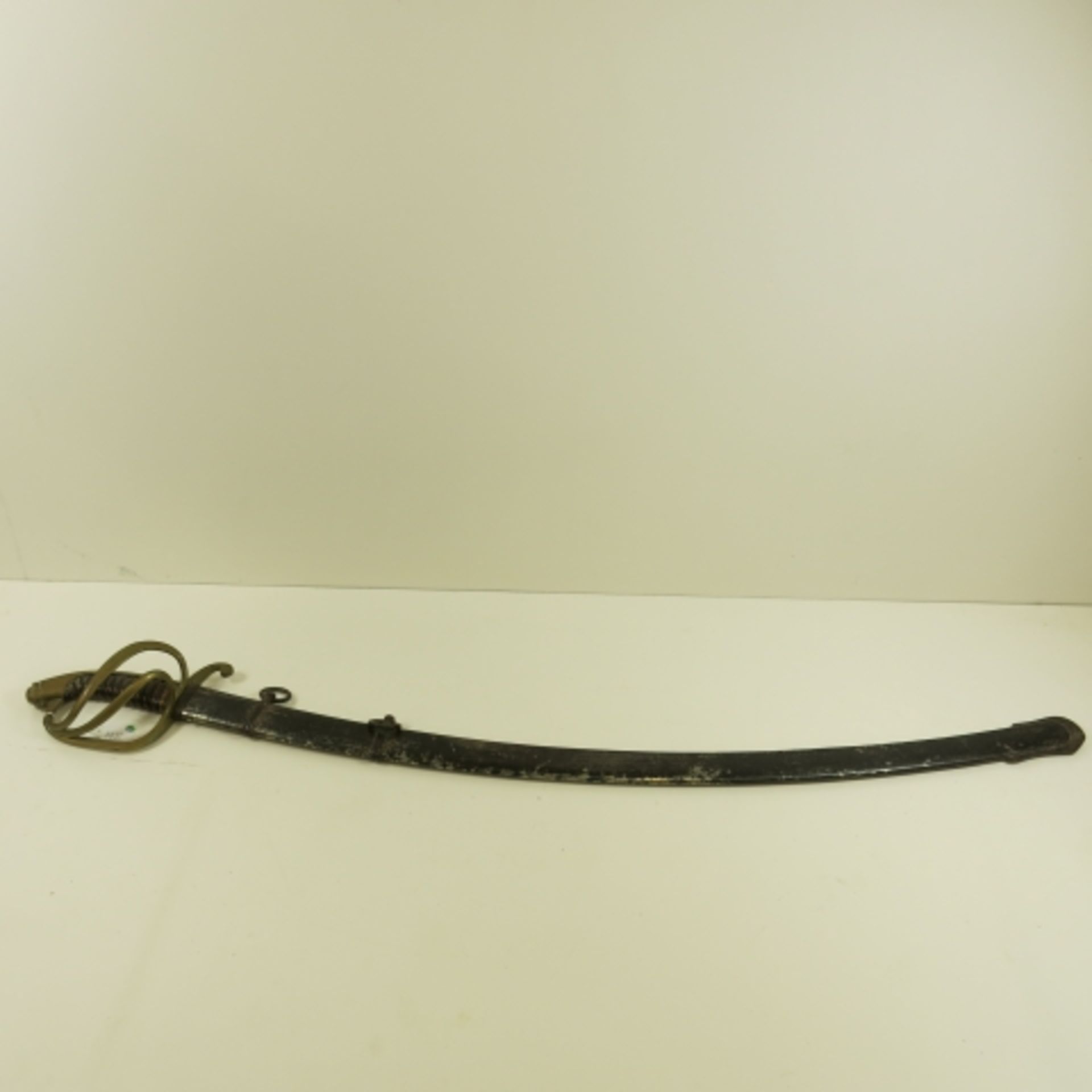 A model 1840 style Sabre called the 'Wrist Breaker' by F. Fichte, Solingen, Germany. Wooden handle