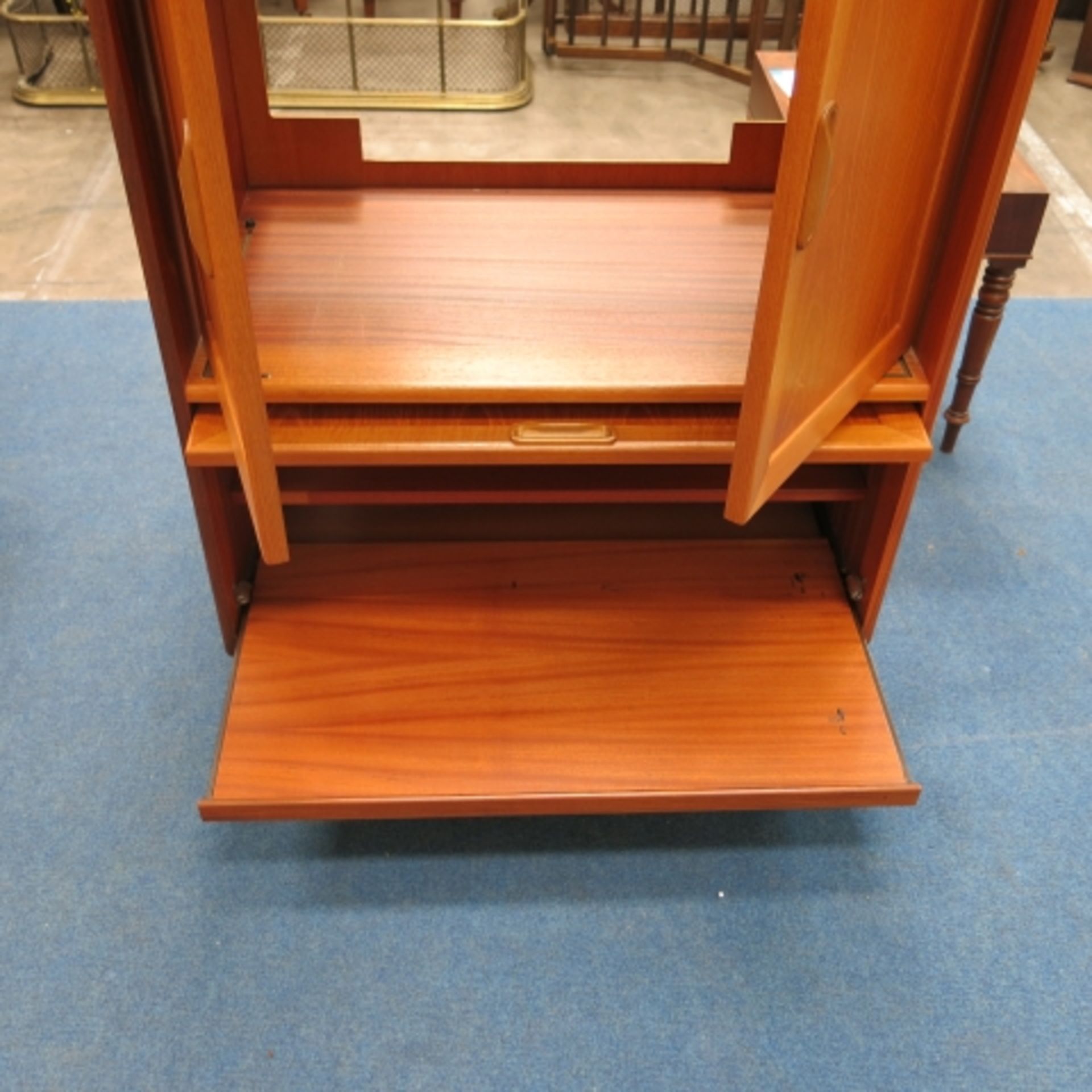 A stripped pine part dressing table, an Ercol style elm wall rack and a teak tv cabinet (3) (est. £ - Image 7 of 7