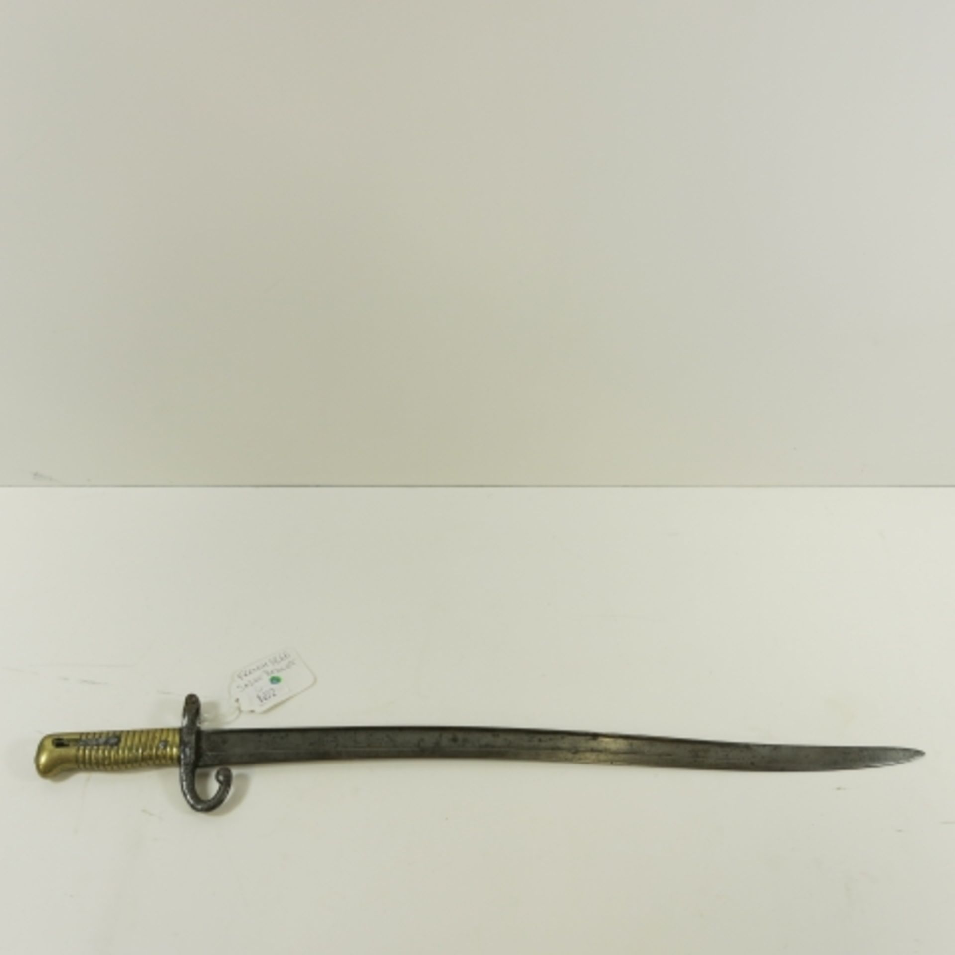 A French 1886 Sabre Bayonet. Blade length 57.4cm (est. £30-£50)