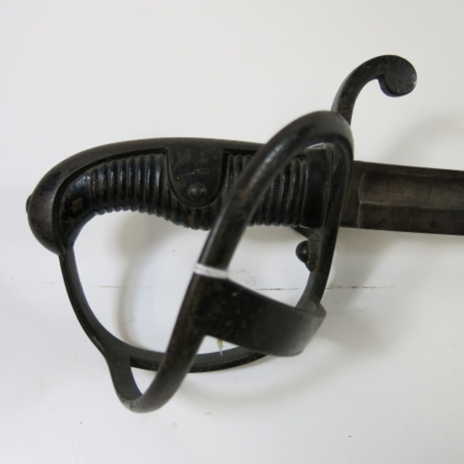 Early 20th century German Cavalry Sword, open basket with wooden grip. 90cm curved blade with - Image 2 of 3
