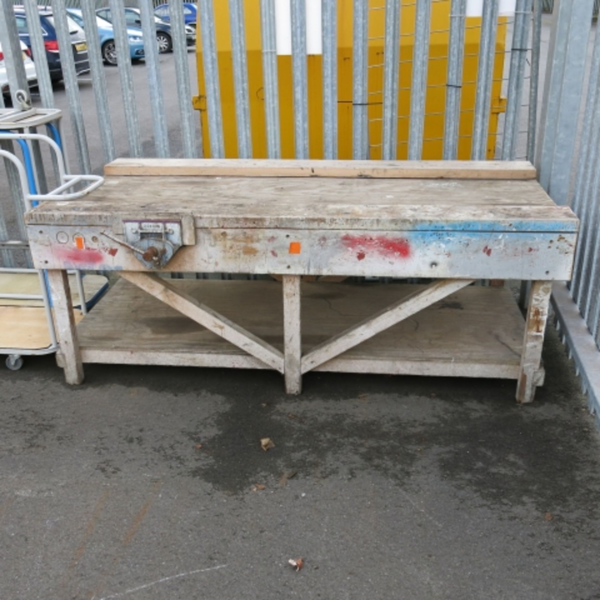 A Wooden Work Bench c/w Record Vice. Please note, there is a £5 plus vat handling fee on this lot.