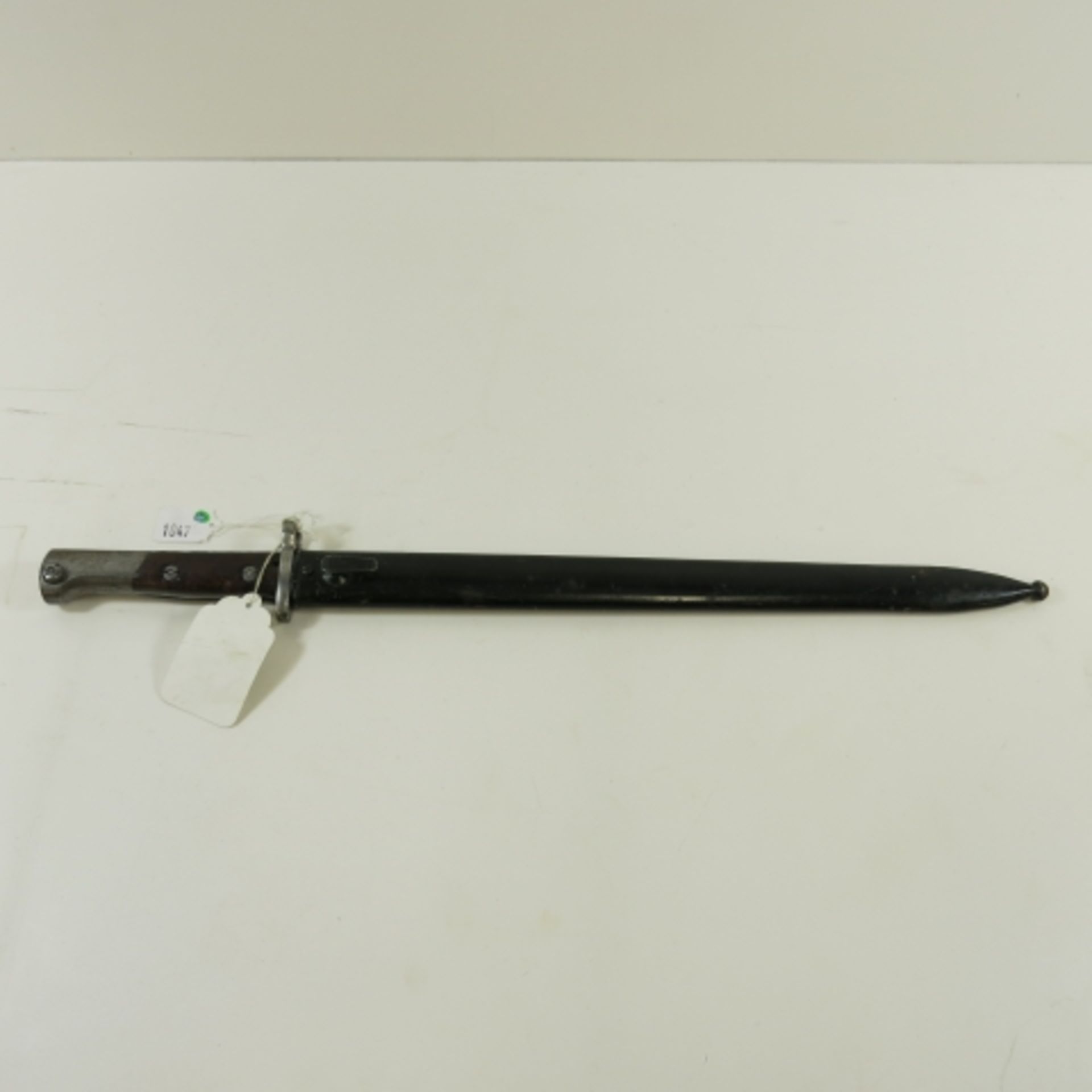 A Mauser M24/47 Bayonet. Blade length 38.4cm (est. £30-£50)