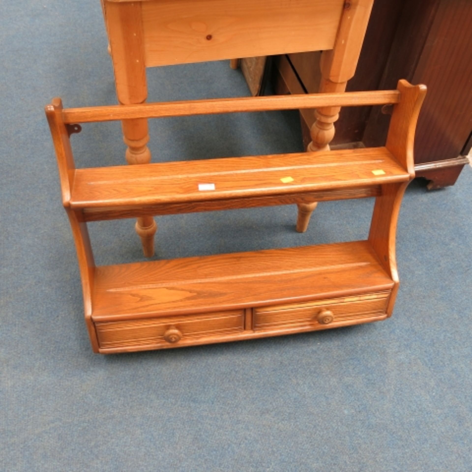 A stripped pine part dressing table, an Ercol style elm wall rack and a teak tv cabinet (3) (est. £