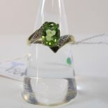 This is a Timed Online Auction on Bidspotter.co.uk, Click here to bid.  A 9ct Gold Peridot and