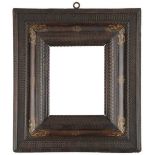 A 17th Century ripple moulding frame,
pear wood veneered, ebonised, reverse frame with various