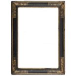 An Italian baroque frame,
black painted and partly gilded, cavetto sight, reverse ogee with engraved