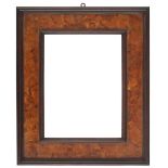 A Tuscan 19th Century cassetta frame,
brown painted, burl veneer, cavetto sight, small ovolo, burl