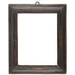 An Italian 18th Century moulding frame,
dark brown painted, cavetto sight, reverse ogee top edge,