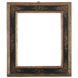 An Italian late 16th Century cassetta frame,
black painted and partly gilded, cavetto sight,