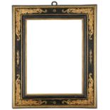An Italian 17th Century cassetta frame,
engraved, black painted and partly gilded, cavetto sight,
