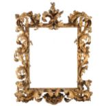 A rare Italian late 17th Century acanthus-leaf frame, 
carved and gilded, tied and centred laurel