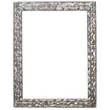 A Spanish early 17th Century baroque frame,
carved and silvered, laurel sight, reverse leaf back