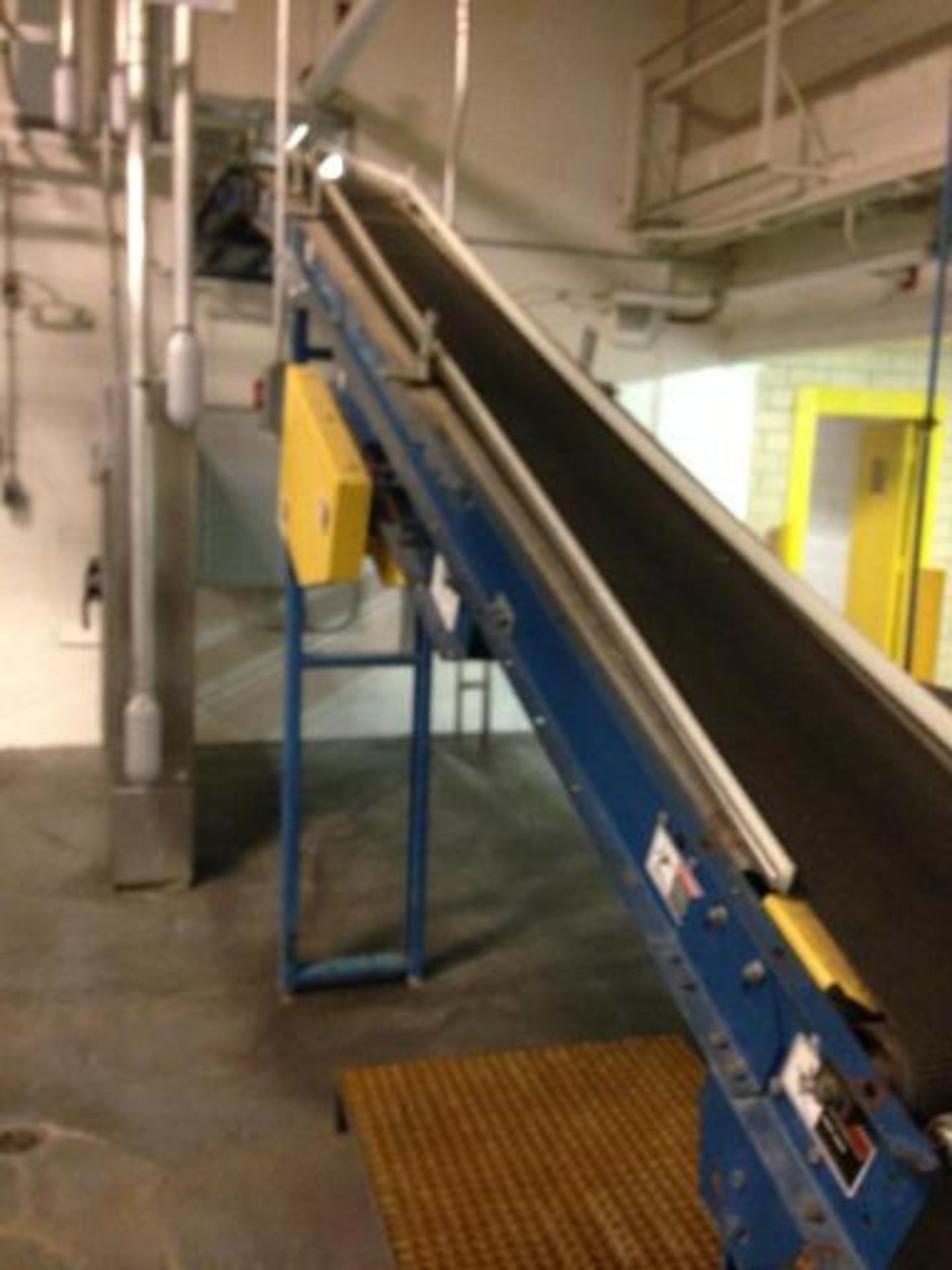 Versa, blue mild steel overhead power case conveyor 12 inch wide rubber belt approx. 100 feet