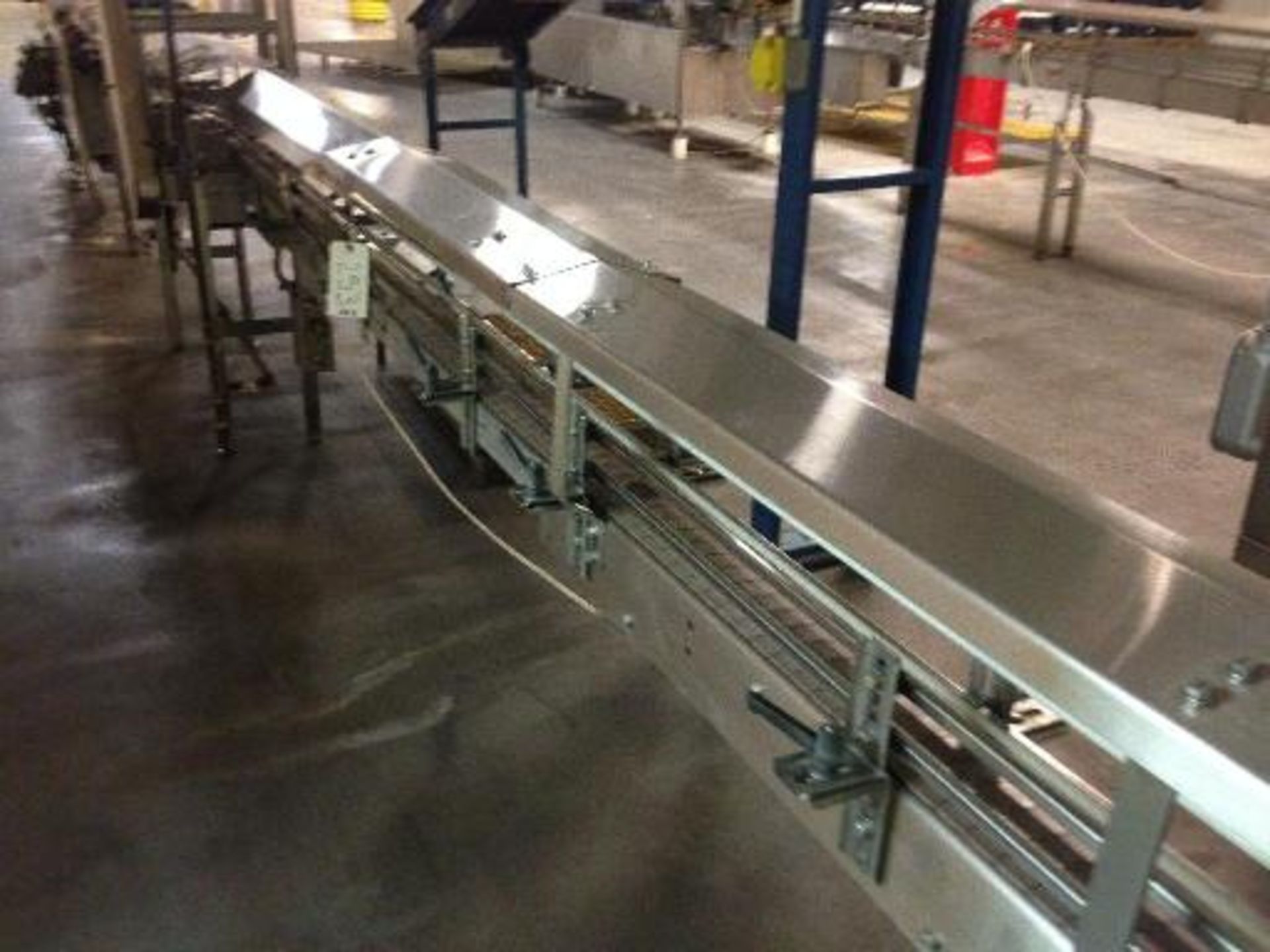 Arrowhead SS bottle conveyor 25 inch long x 4 1/2 inch wide table top chain. Infeed to filler, no