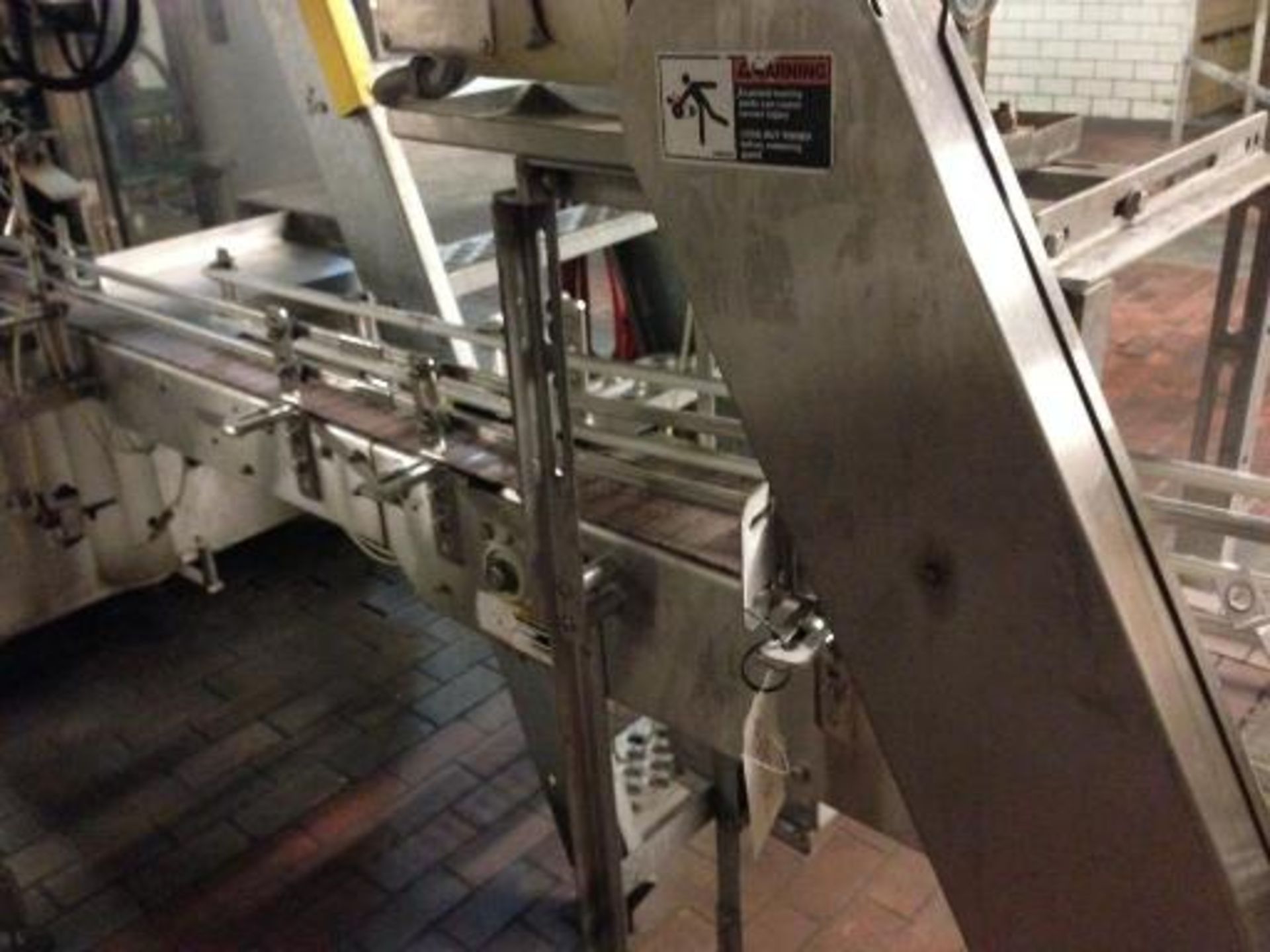 Arrowhead SS Outfeed conveyor, (missing belt) bottle conveyor, (one end) 4 1/2 inch wide table top