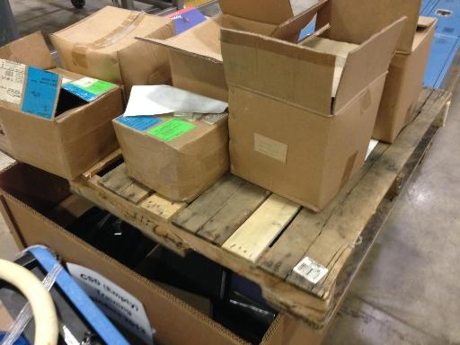 Skid with binders, conveyor hardware (LOT) This item located in Grand Rapids, Michigan **__ A