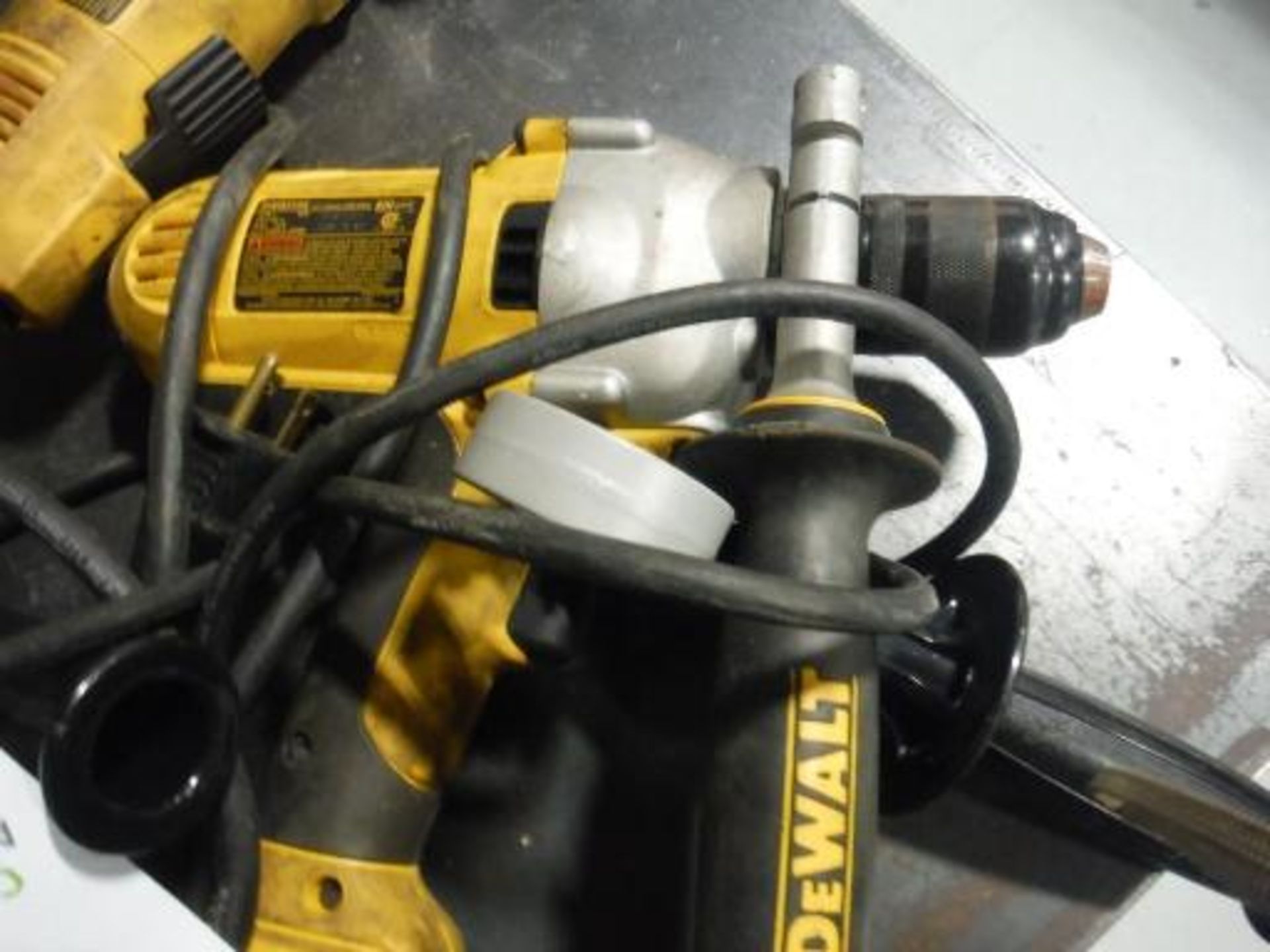(1) Dewalt electric drill, (1) Dewalt 14 Gauge Nibbler. Located in Marion, Ohio Rigging Fee: $25 - Image 2 of 5
