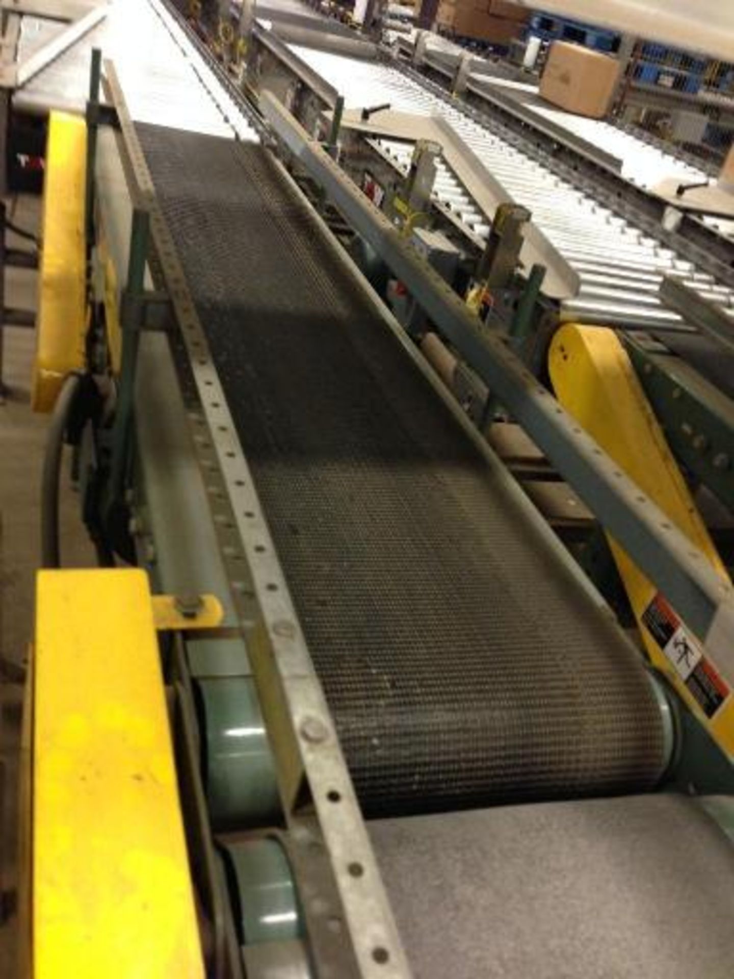 Hytrol belt conveyor16 inch x 5 feet long. Located in Marion, Ohio Rigging Fee: $200