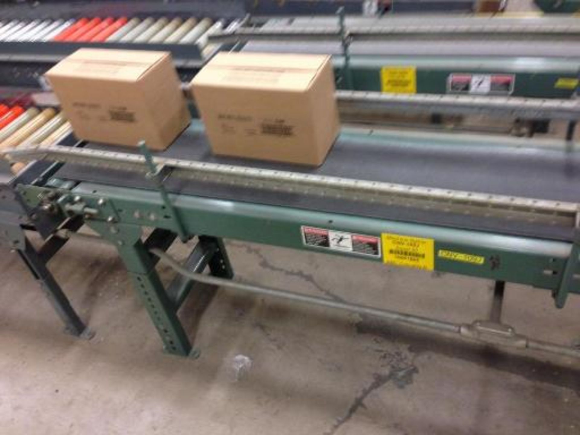 Hytrol belt conveyor16 inch x 5 feet long. Located in Marion, Ohio Rigging Fee: $200