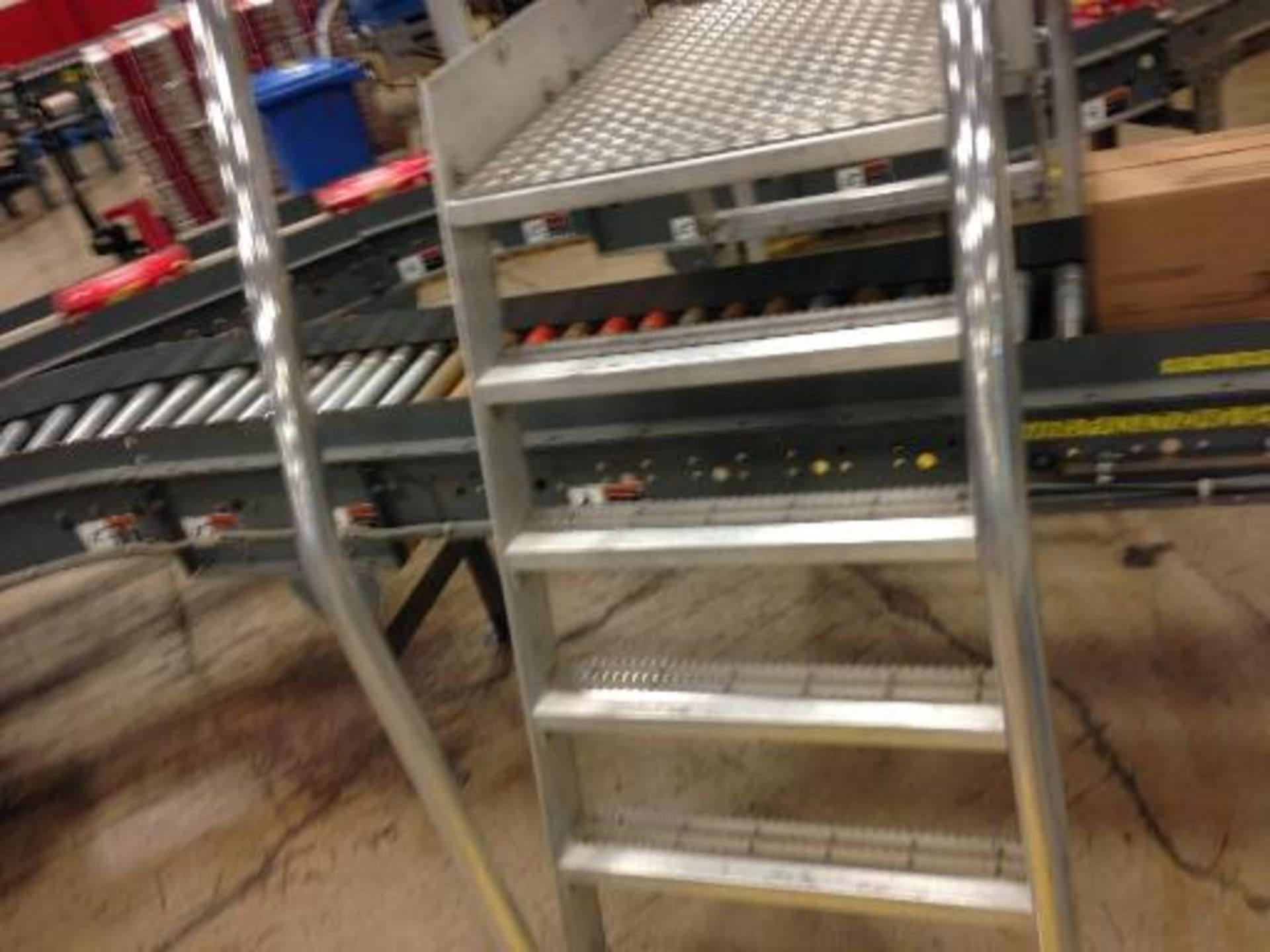Full case conveyor 40 feet long to palletized (line 13) right to left stand alone line. Located in