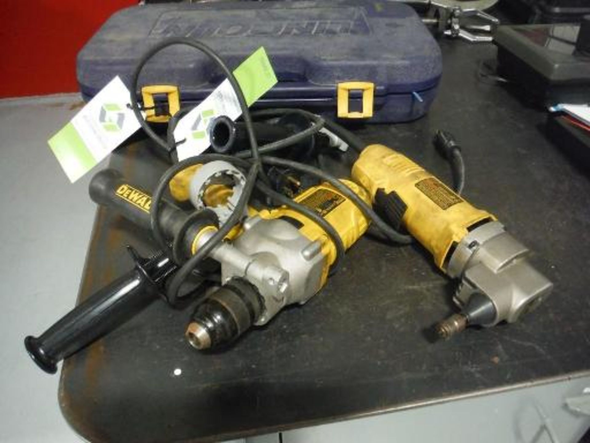 (1) Dewalt electric drill, (1) Dewalt 14 Gauge Nibbler. Located in Marion, Ohio Rigging Fee: $25