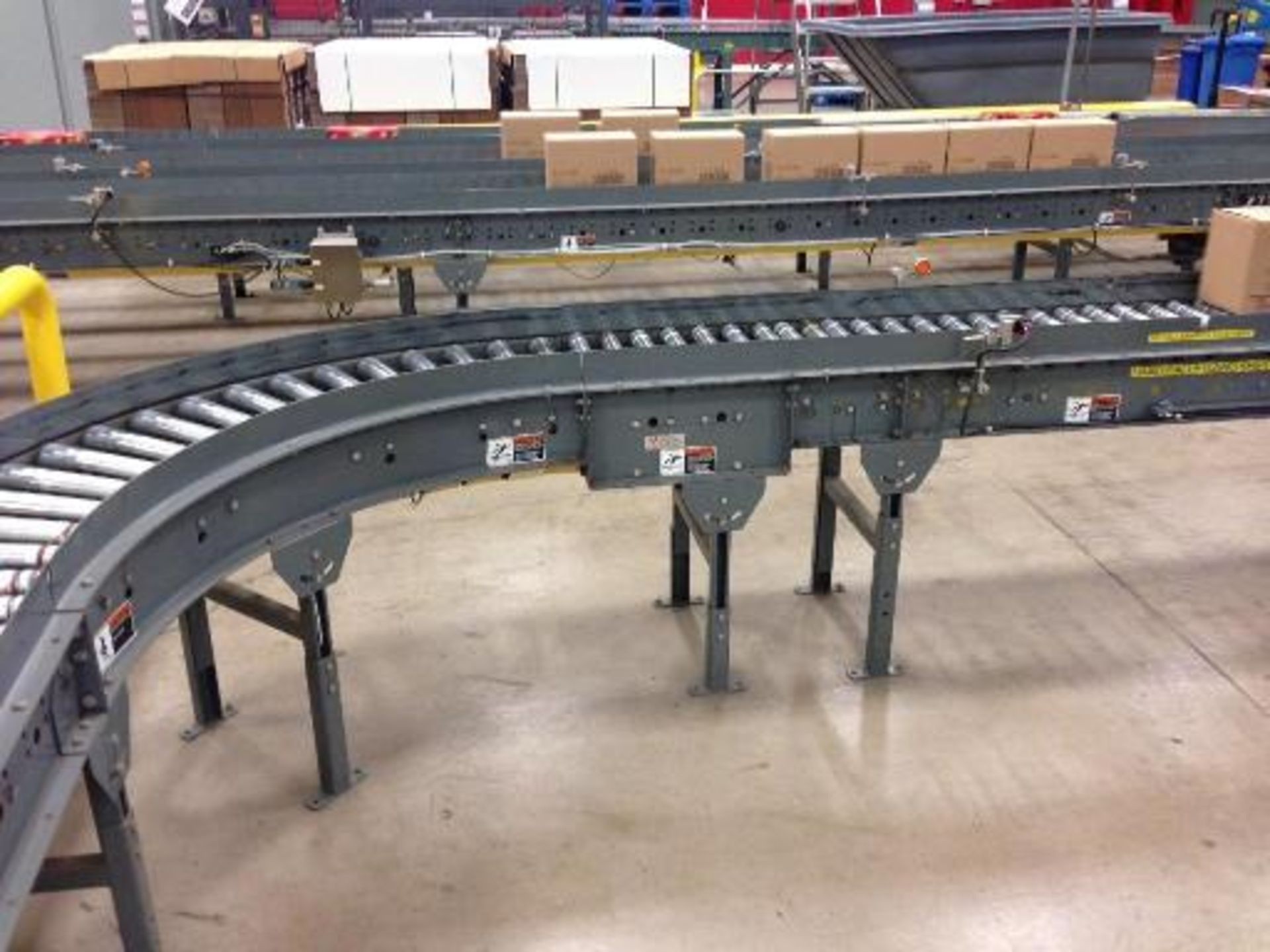 Versa power roller conveyor 60 feet long (line 12) right to left. Located in Marion, Ohio Rigging