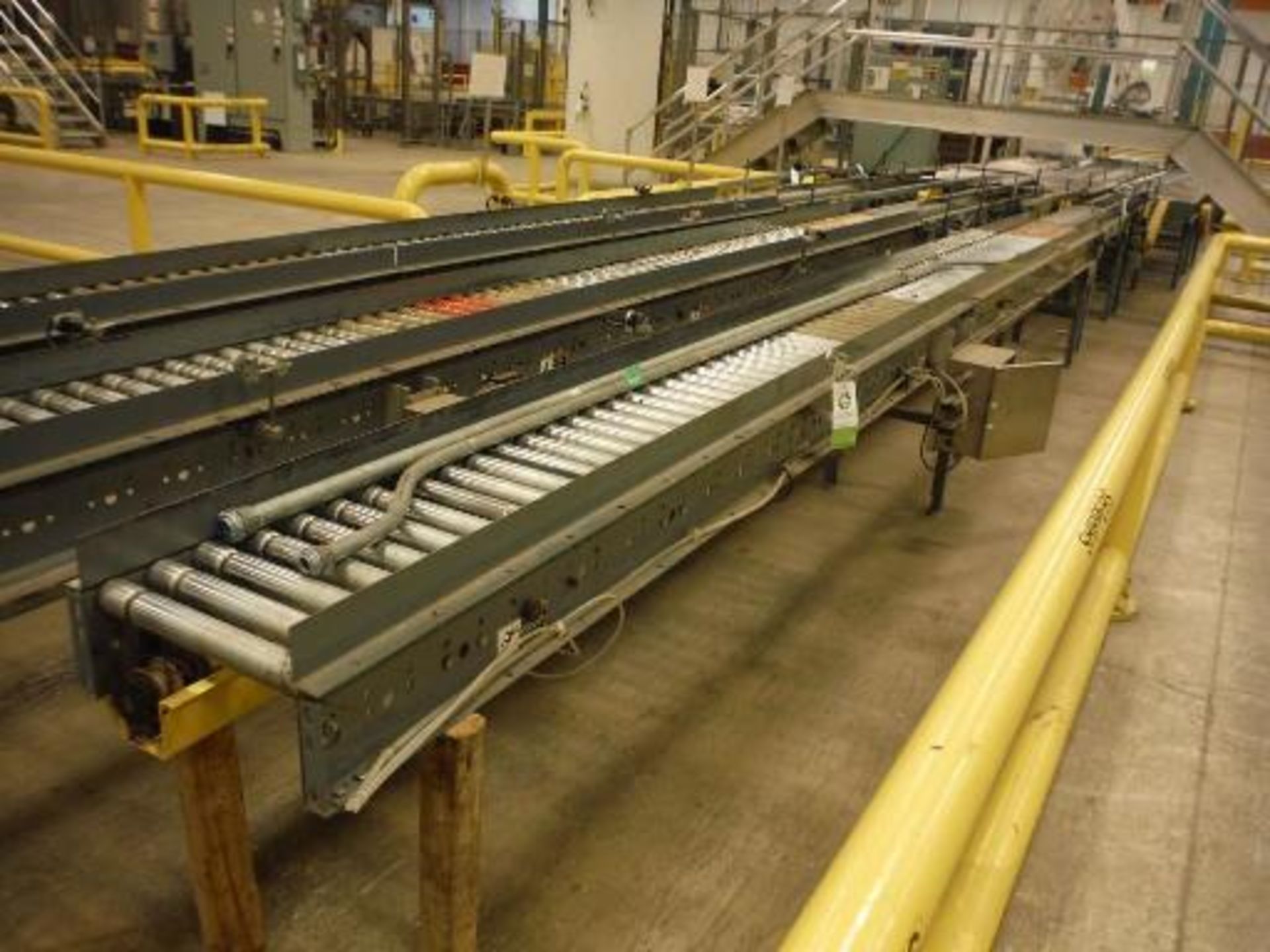 MIld steel power roller conveyor, 21ft left. Located in Marion, Ohio Rigging Fee: $800