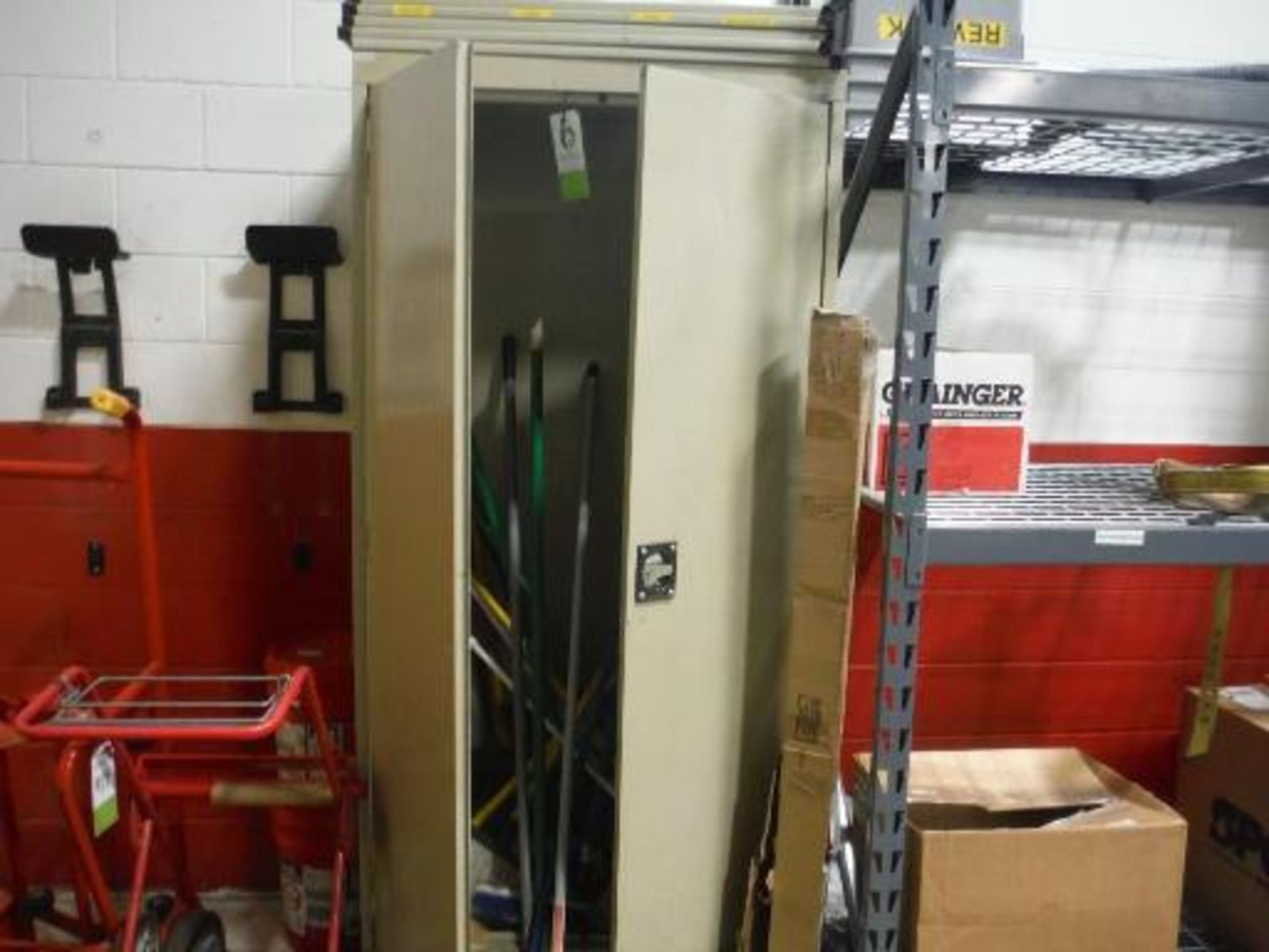 MS 2 door cabinet w/ contents. Located in Marion, Ohio Rigging Fee: $150