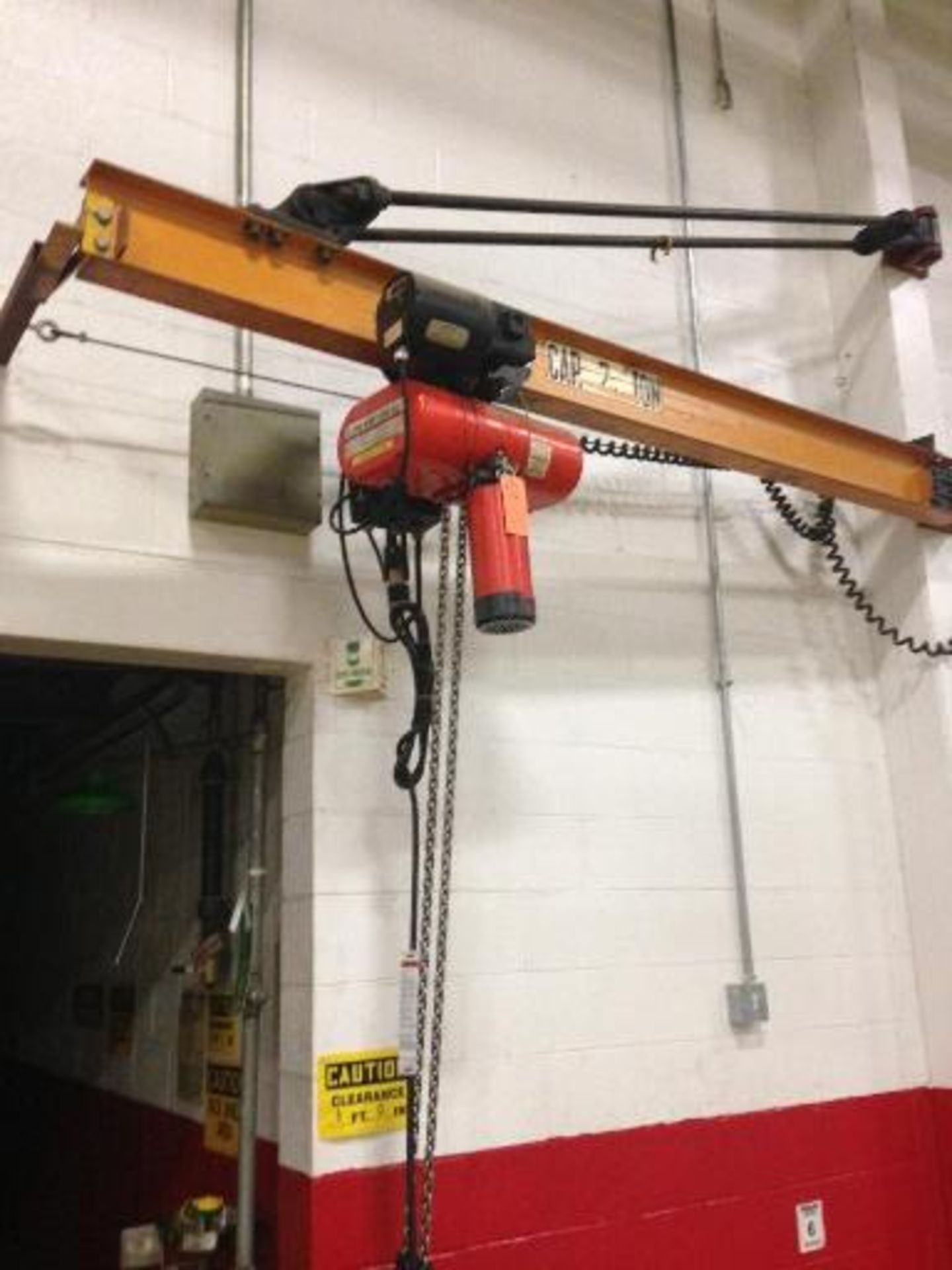 Wall mount job hoist with electric hoist. Located in Marion, Ohio Rigging Fee: $600