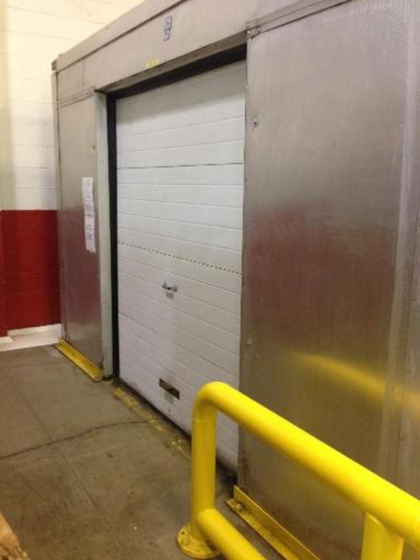 Insulated drive in cooler 12 ft x 56 ft roll up door NO COMPRESSOR. Located in Marion, Ohio