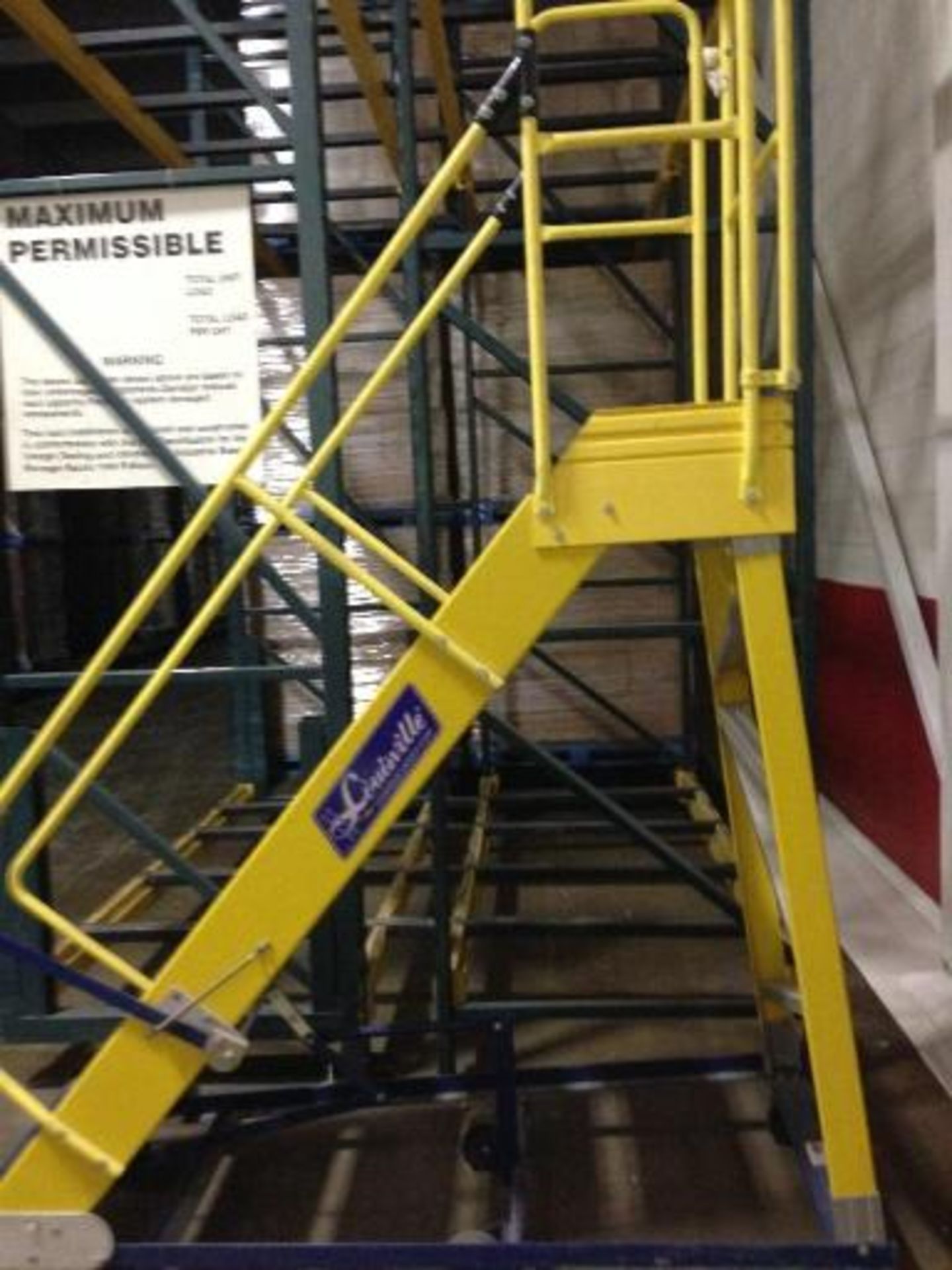 Louisville rolling warehouse ladder. Located in Marion, Ohio Rigging Fee: $25