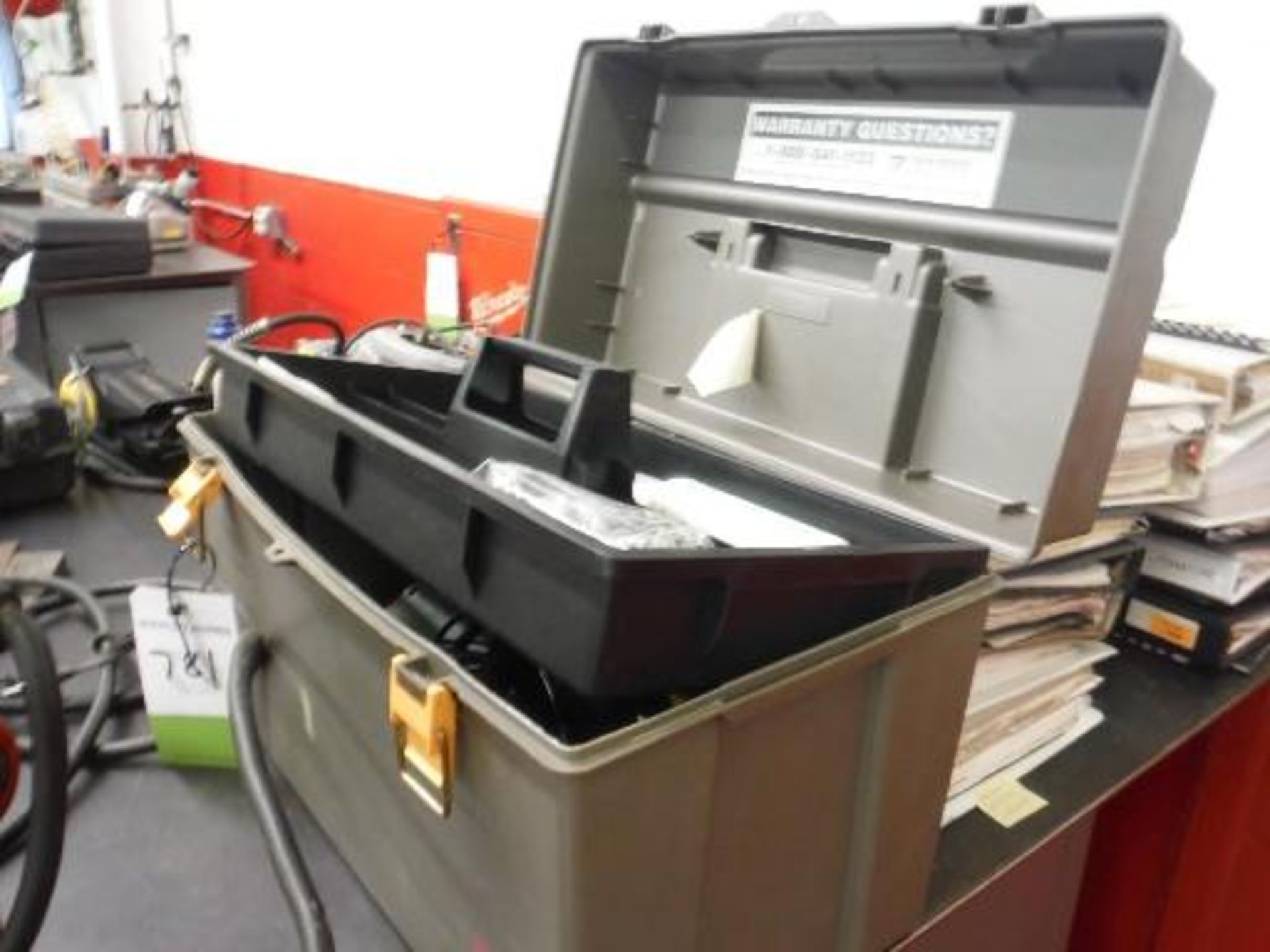 Plastic tool chest with UV lamp. Located in Marion, Ohio Rigging Fee: $25