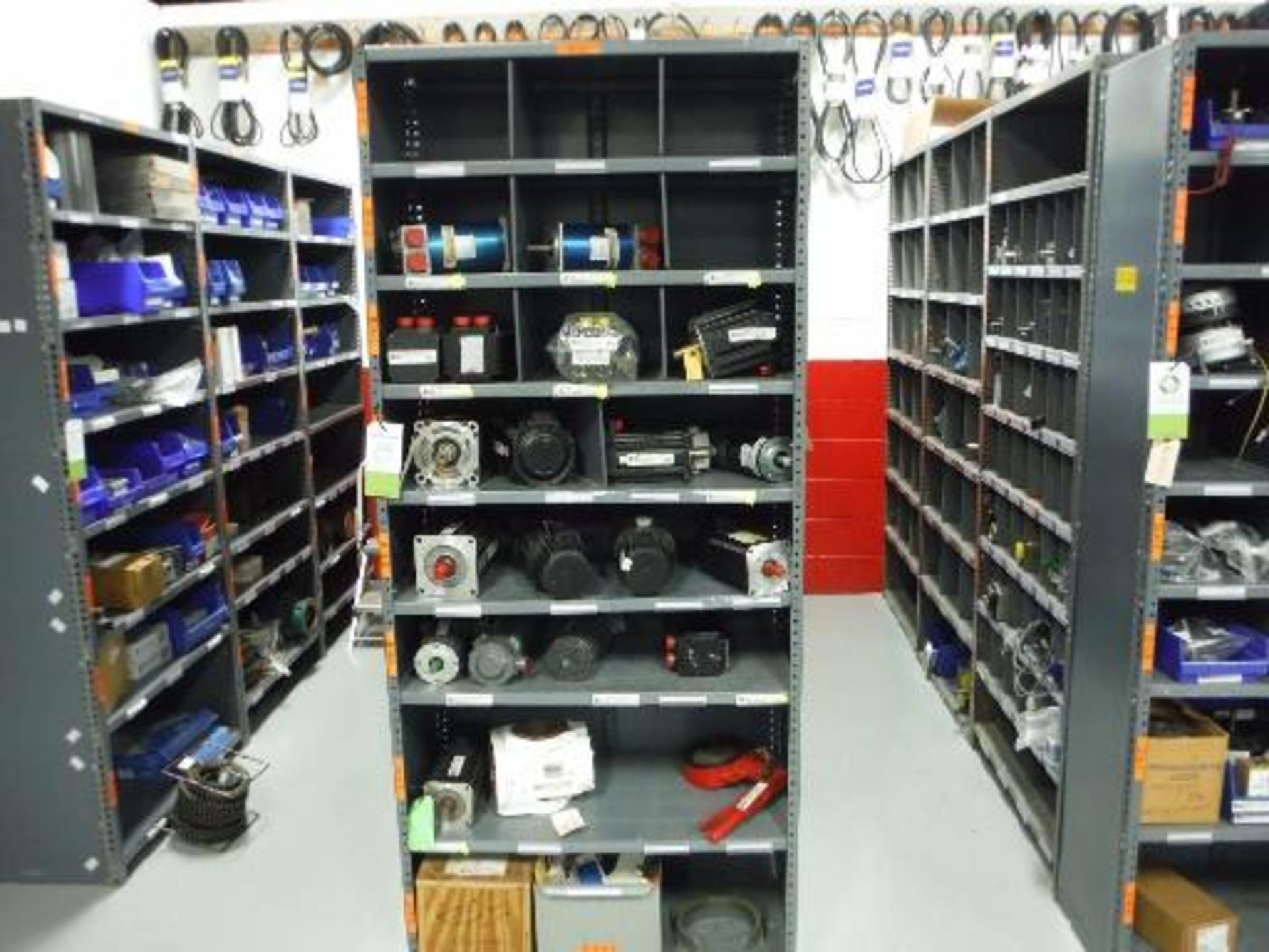 (7) MS Shelves with contents, including miscellaneous gearboxes, motors and parts. Located in