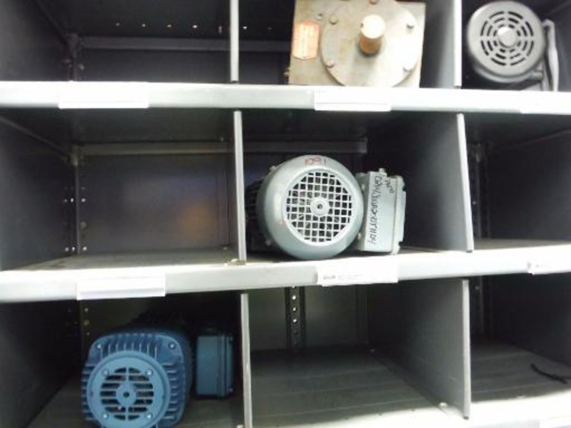 (7) MS Shelves with contents, including miscellaneous gearboxes, motors and parts. Located in - Image 7 of 30