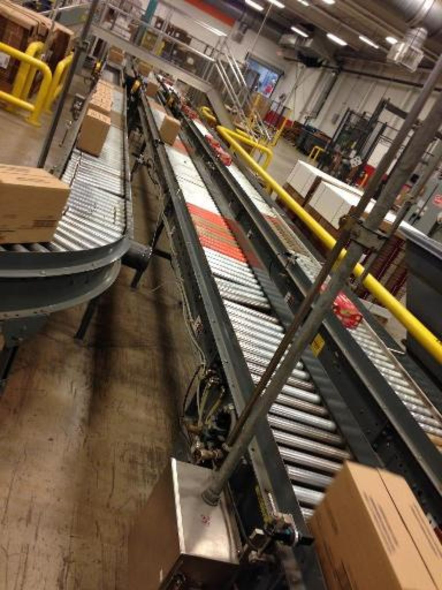 Full case conveyor 40 feet long to palletized (line 13) right to left stand alone line. Located in - Image 4 of 6