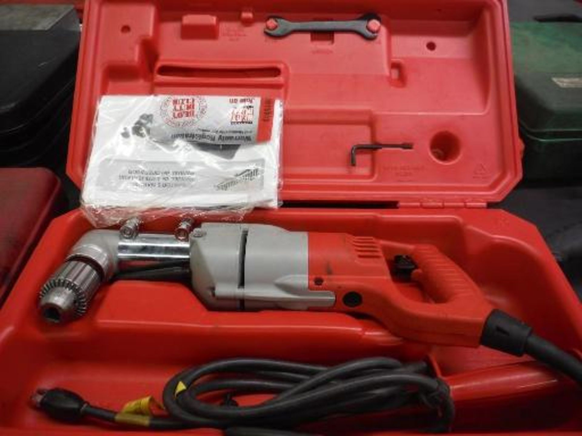 Milwaukee heavy duty electric 90 degree drill in case. Located in Marion, Ohio Rigging Fee: $25