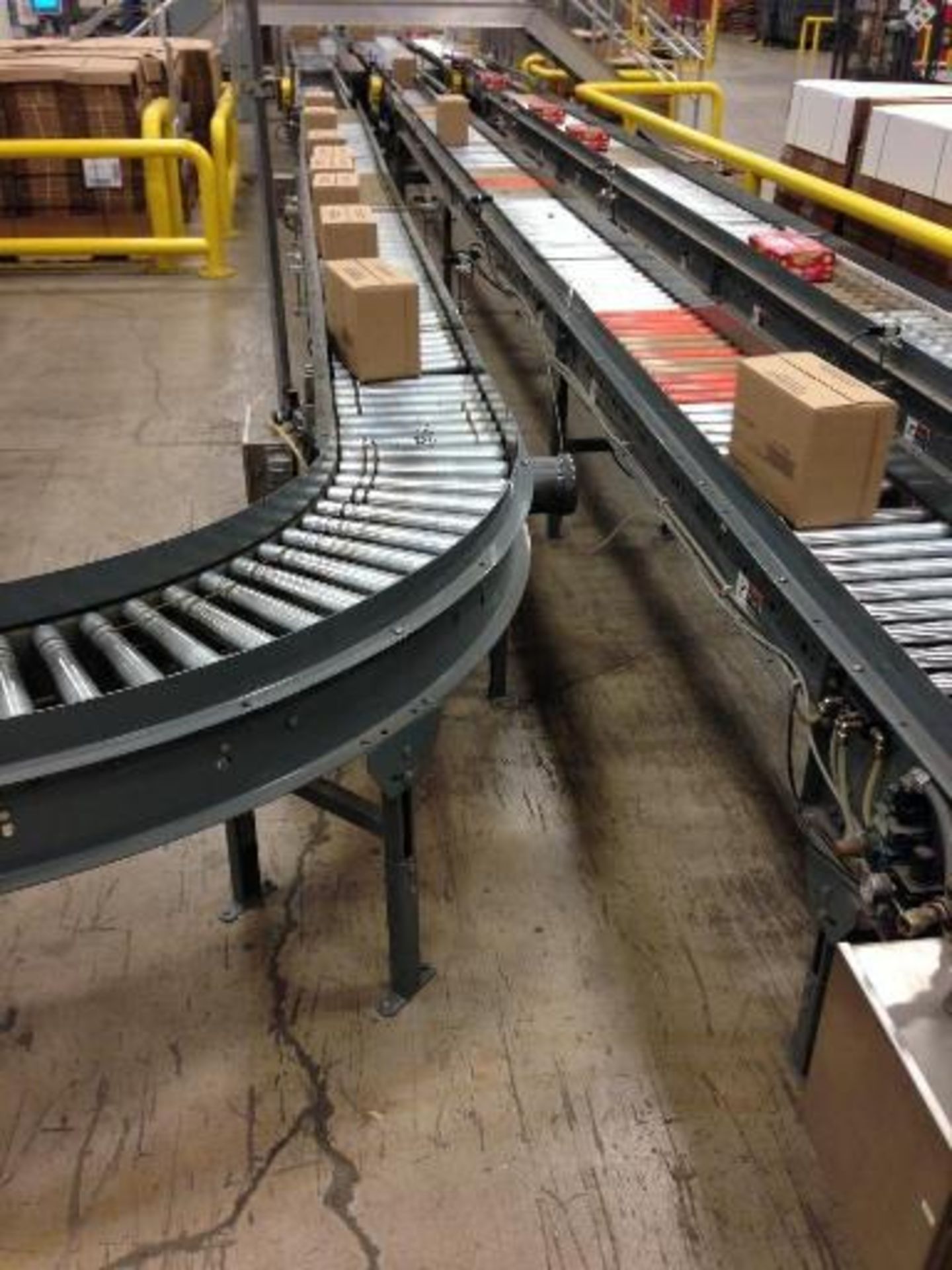 Full case conveyor 40 feet long to palletized (line 13) right to left stand alone line. Located in - Image 5 of 6